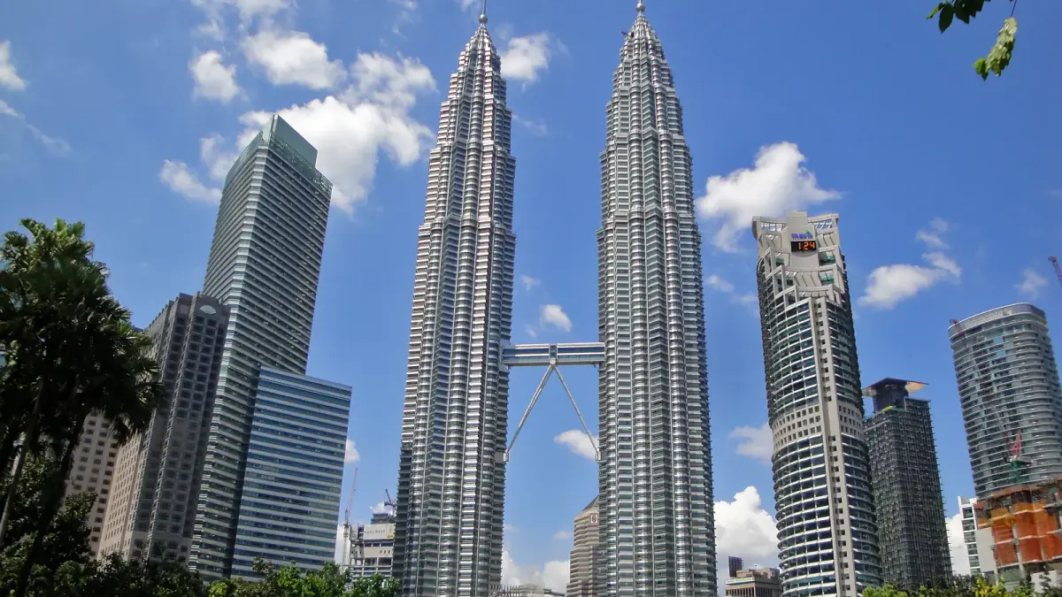 Petronas Twin Towers in Kuala Lumpur cityscape for Malaysia tourist visa