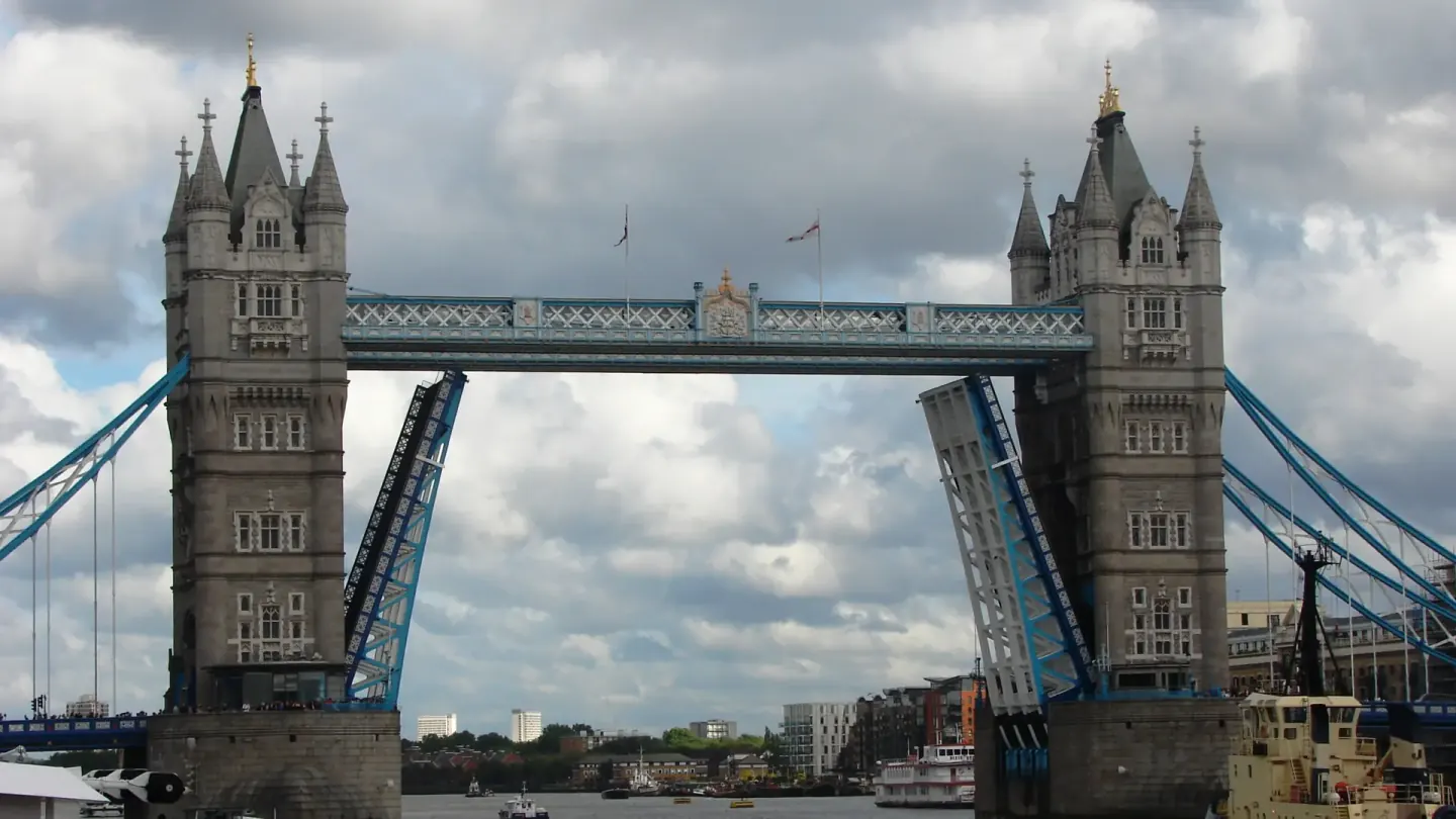 Tower Bridge opening over River Thames for UK visitor visa applicants